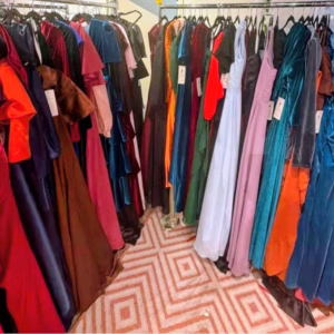 Wholesale Lot Of 50 Brand New Evening, Party, And Prom Dresses - Assorted Colors, Sizes, And Styles - Actual Dresses In The Picture - Suggested Retail Values To $150 Each - Your Price Is Only $15 Each