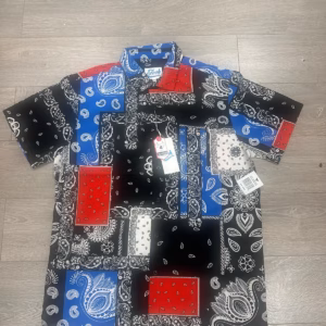 Wholesale Lot Of 43,470 Pieces Of Men's Summer Short Sleeve Button Down Shirts – Assorted Sizes – Suggested Retail Prices To $25.00 Each – Your Price Is Only $1.65 Each